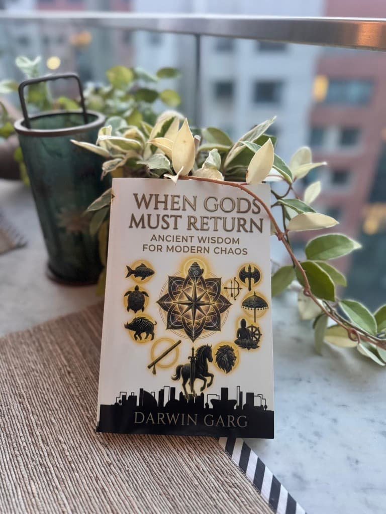 When Gods Must Return on a balcony table